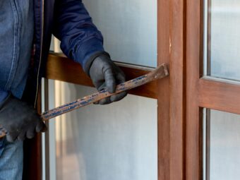 a-thief-trying-to-burden-a-window-door-with-the-cr-2024-09-12-13-00-57-utc